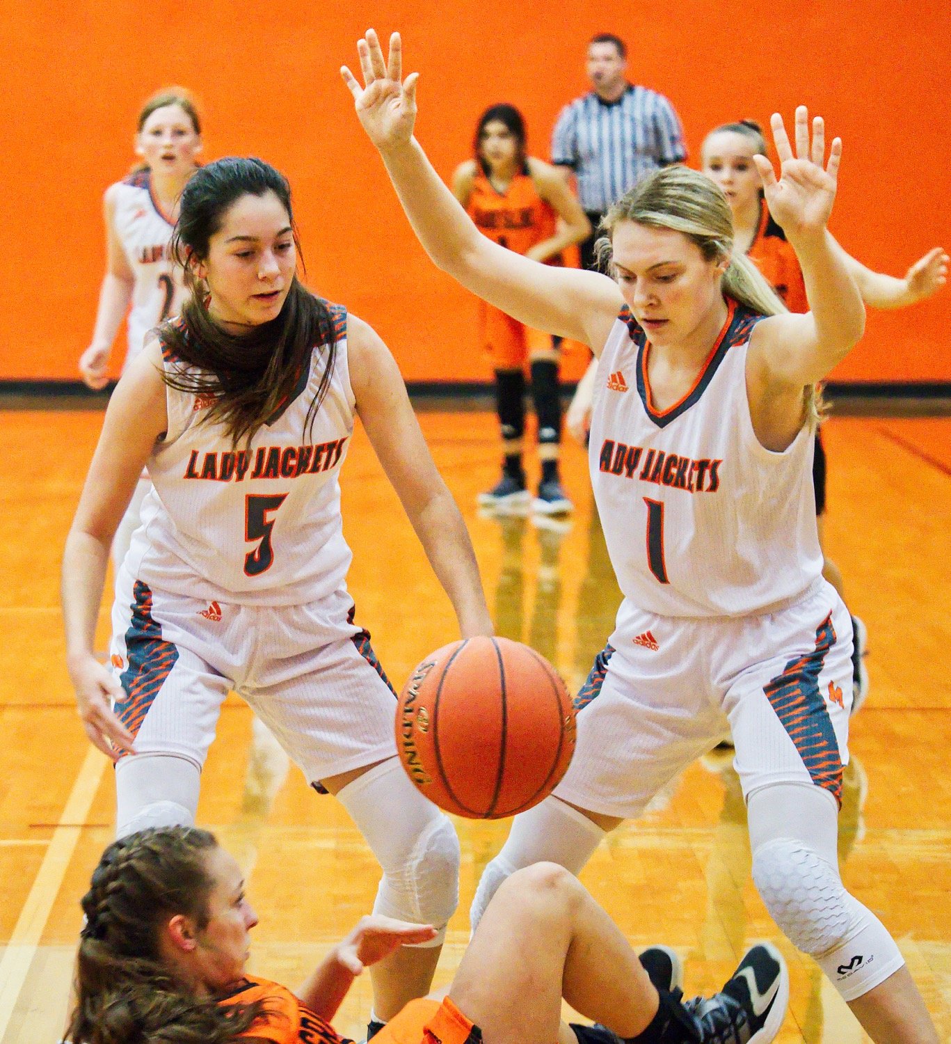 Kapri Riley (5) and Ava Johnson (1) put the defensive clamps on Grand Saline, part of a defensive effort that held the visiting Lady Indians to just 13 points. [more shots plus prints available]